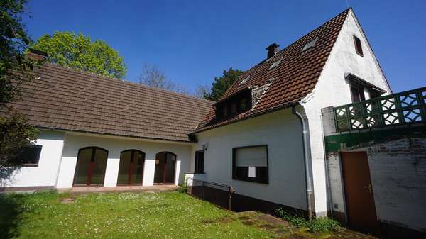 Gartenansicht des Hauses - Zweifamilienhaus in 47441 Moers mit 291m² kaufen