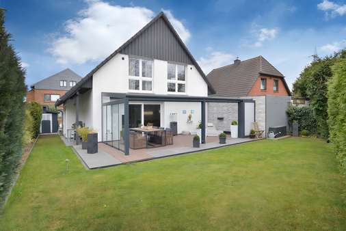 Gartenansicht des Hauses Gartenansicht des Hauses - Einfamilienhaus in 47228 Duisburg mit 141m² kaufen