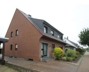 Seitenansicht des Gebäudes - Zweifamilienhaus in 47495 Rheinberg mit 200m² günstig kaufen