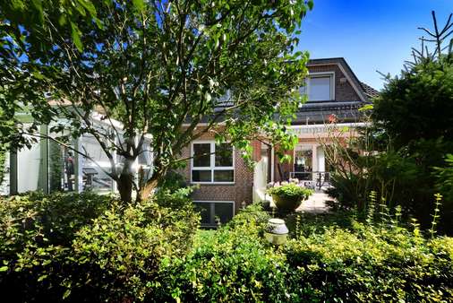 Gartenansicht des Hauses - Einfamilienhaus in 47445 Moers mit 156m² kaufen