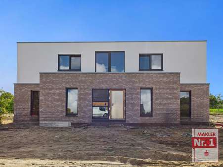 Frontansicht Haus Emscherweg 9 (1. Bauabschnitt) Frontansicht Haus Emscherweg 9 (1. Bauabschnitt) - Erdgeschosswohnung in 46487 Wesel mit 91m² kaufen