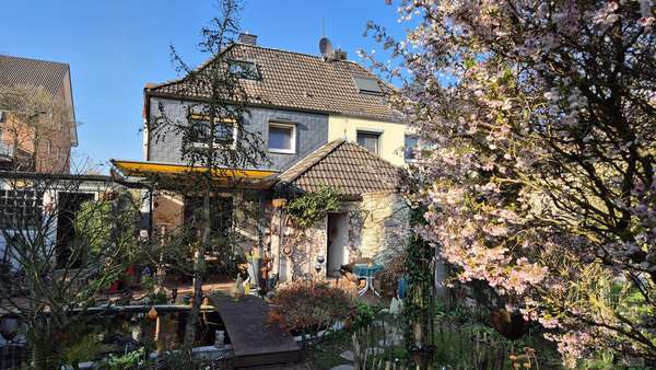 Rückansicht Rückansicht - Doppelhaushälfte in 44793 Bochum mit 78m² kaufen