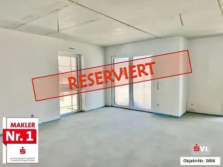 schlüsselfertiger Neubau -barrierearme Etagenwohnung mit Balkon und zwei Tiefgaragenstellplätzen