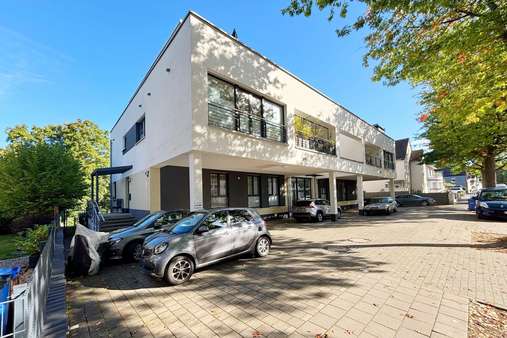 Seitenansicht - Souterrain-Wohnung in 51375 Leverkusen mit 96m² kaufen