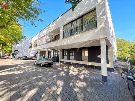Seitenansicht - Souterrain-Wohnung in 51375 Leverkusen mit 96m² kaufen