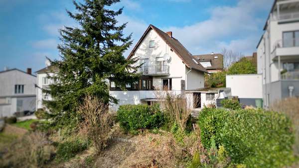 Außenansicht Rückseite Außenansicht Rückseite - Einfamilienhaus in 51381 Leverkusen mit 113m² kaufen