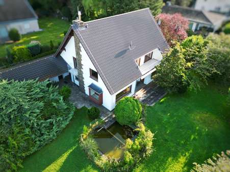 Seitenansicht - Einfamilienhaus in 51519 Odenthal mit 217m² kaufen