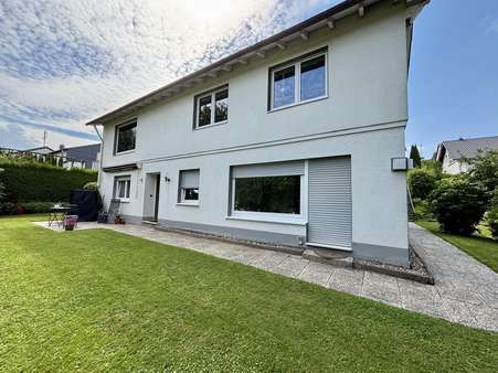 Gartenansicht Gartenansicht - Souterrain-Wohnung in 51674 Wiehl mit 67m² mieten
