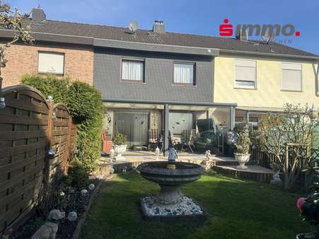 Garten mit Logo - Einfamilienhaus in 52477 Alsdorf mit 98m² kaufen