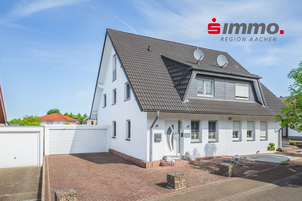 Titelbild mit Logo - Einfamilienhaus in 52531 Übach-Palenberg mit 107m² kaufen