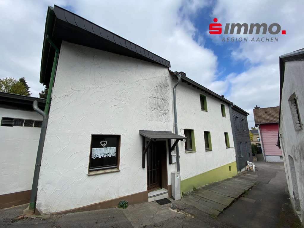 Frontansicht mit Logo - Einfamilienhaus in 52224 Stolberg (Rheinland) mit 88m² kaufen