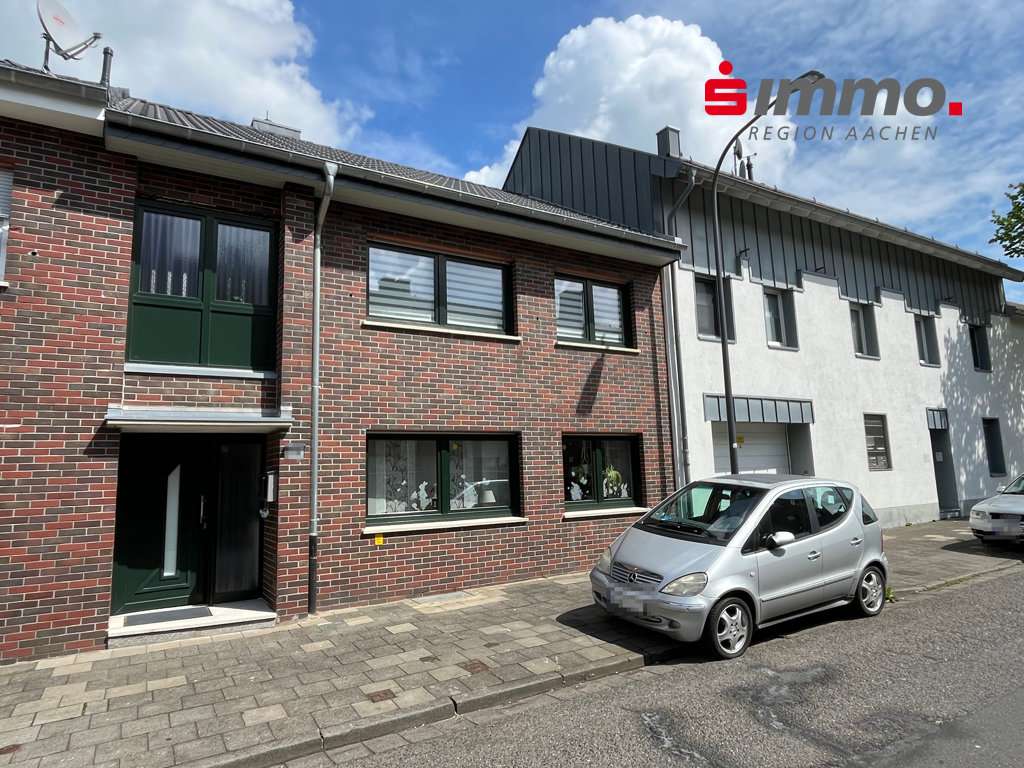 Front mit Logo Front mit Logo - Einfamilienhaus in 52499 Baesweiler mit 135m² kaufen