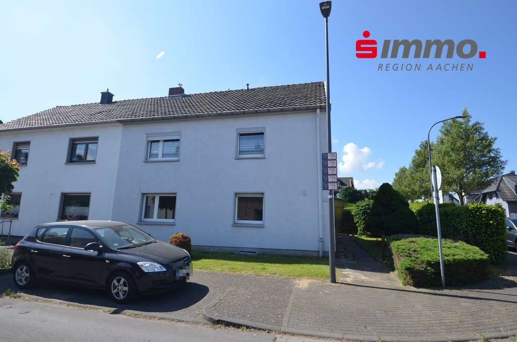 Front mit Logo Front mit Logo - Einfamilienhaus in 52499 Baesweiler mit 116m² kaufen