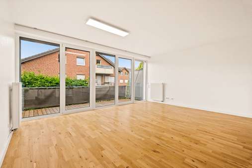 Wohnzimmer - Penthouse-Wohnung in 52146 Würselen mit 130m² kaufen