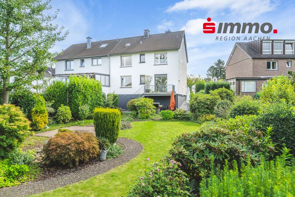 Titelbild mit Logo - Einfamilienhaus in 52499 Baesweiler mit 110m² kaufen