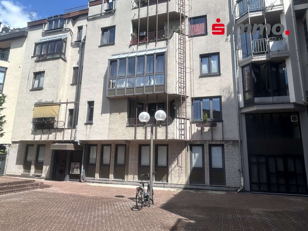 Front mit Logo Front mit Logo - Etagenwohnung in 52249 Eschweiler mit 71m² kaufen