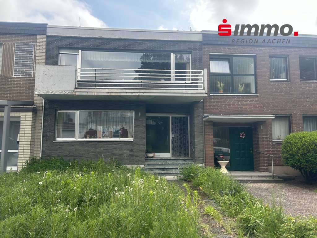 Front mit Logo Front mit Logo - Einfamilienhaus in 52249 Eschweiler mit 132m² kaufen