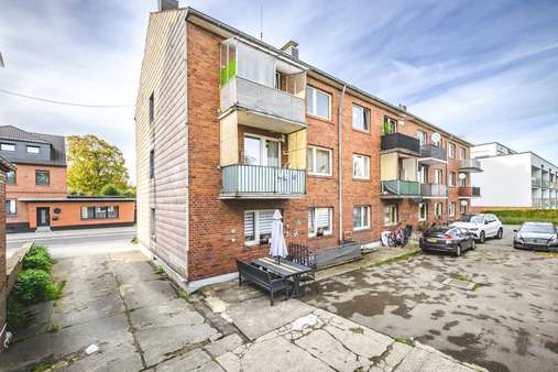 Rückansicht 1 - Mehrfamilienhaus in 52249 Eschweiler mit 382m² als Kapitalanlage kaufen