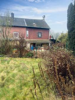 Rückansicht mit Garten_2 - Einfamilienhaus in 52134 Herzogenrath mit 66m² kaufen