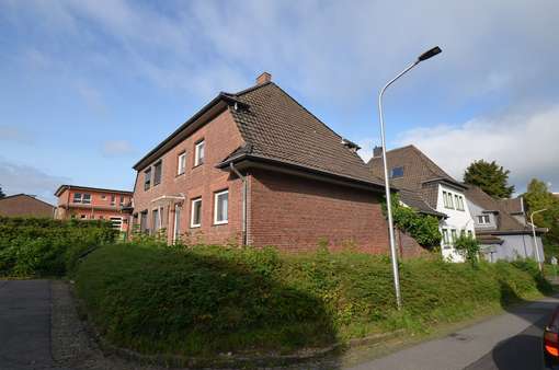 Seitenansicht - Einfamilienhaus in 52134 Herzogenrath mit 114m² kaufen