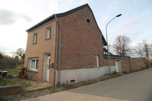 Seitenansicht - Einfamilienhaus in 52445 Titz / Spiel mit 112m² kaufen