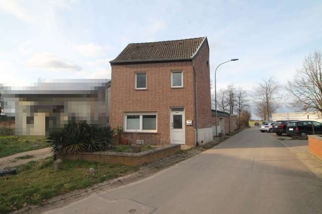 Straßenansicht  - Einfamilienhaus in 52445 Titz / Spiel mit 112m² kaufen