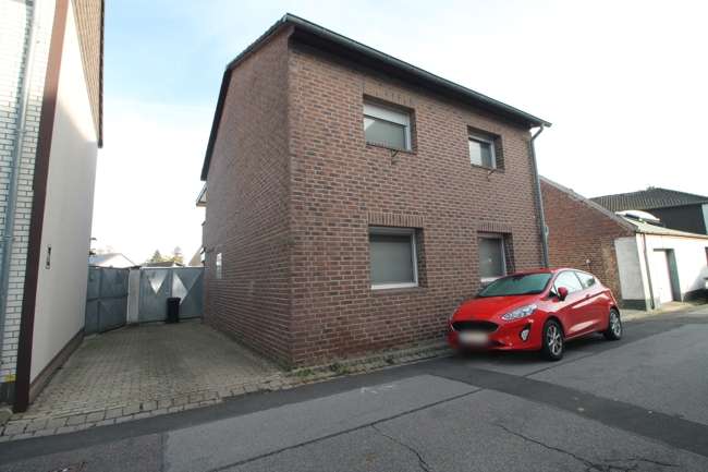 Straßenansicht - Einfamilienhaus in 52445 Titz / Hasselsweiler mit 128m² kaufen