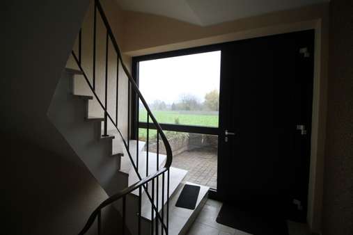 Hauseingang - Souterrain-Wohnung in 52445 Titz-Ameln mit 67m² kaufen