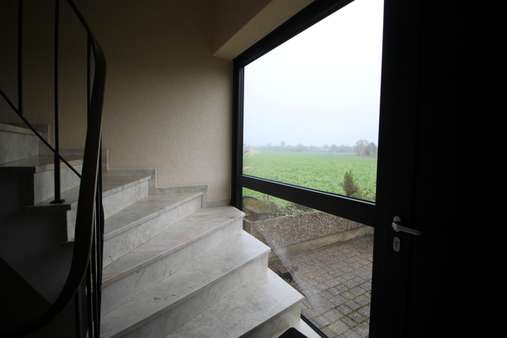 Hauseingang - Dachgeschosswohnung in 52445 Titz-Ameln mit 65m² als Kapitalanlage kaufen