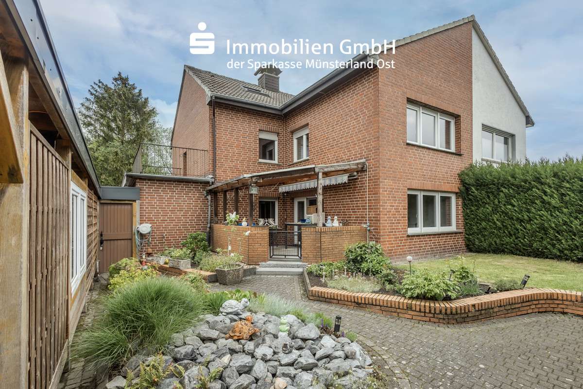 Rückansicht - Zweifamilienhaus in 59269 Beckum mit 156m² kaufen