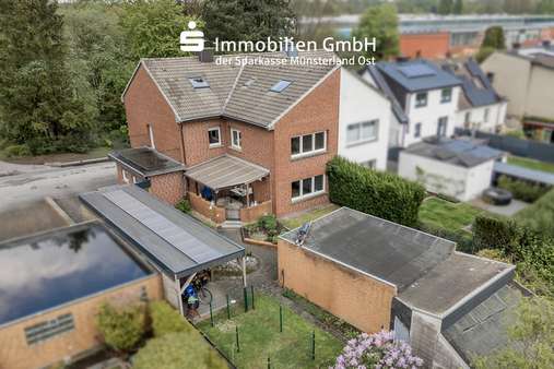 Vogelperspektive - Zweifamilienhaus in 59269 Beckum mit 156m² kaufen