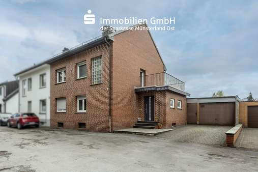 Vorderansicht - Zweifamilienhaus in 59269 Beckum mit 156m² kaufen
