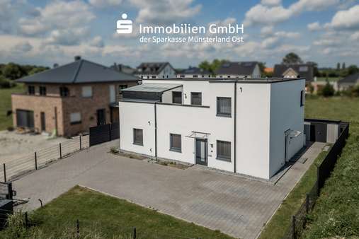 Vogelperspektive Vogelperspektive - Zweifamilienhaus in 59329 Wadersloh mit 165m² kaufen