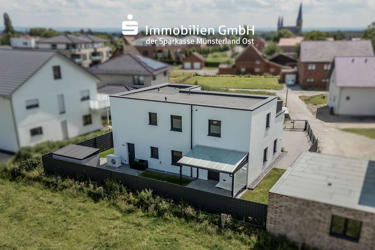 Vogelperspektive Vogelperspektive - Zweifamilienhaus in 59329 Wadersloh mit 165m² kaufen