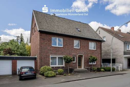 Vorderansicht - Zweifamilienhaus in 59302 Oelde mit 149m² kaufen