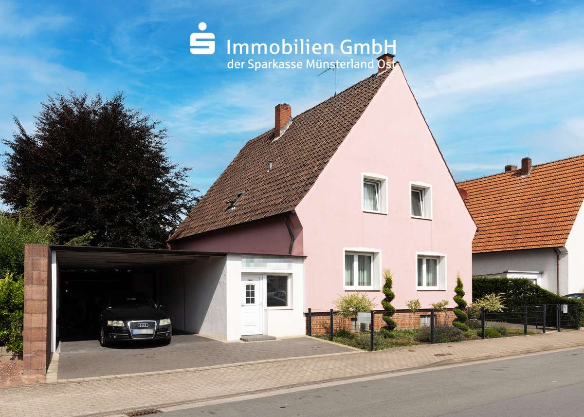 Ansicht mit Carport - Einfamilienhaus in 48231 Warendorf mit 133m² kaufen
