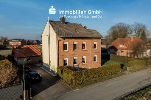 Vorderansicht - Zweifamilienhaus in 59227 Ahlen mit 111m² kaufen