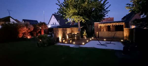 Garten an einem Sommerabend - Dachgeschosswohnung in 48282 Emsdetten mit 77m² günstig kaufen