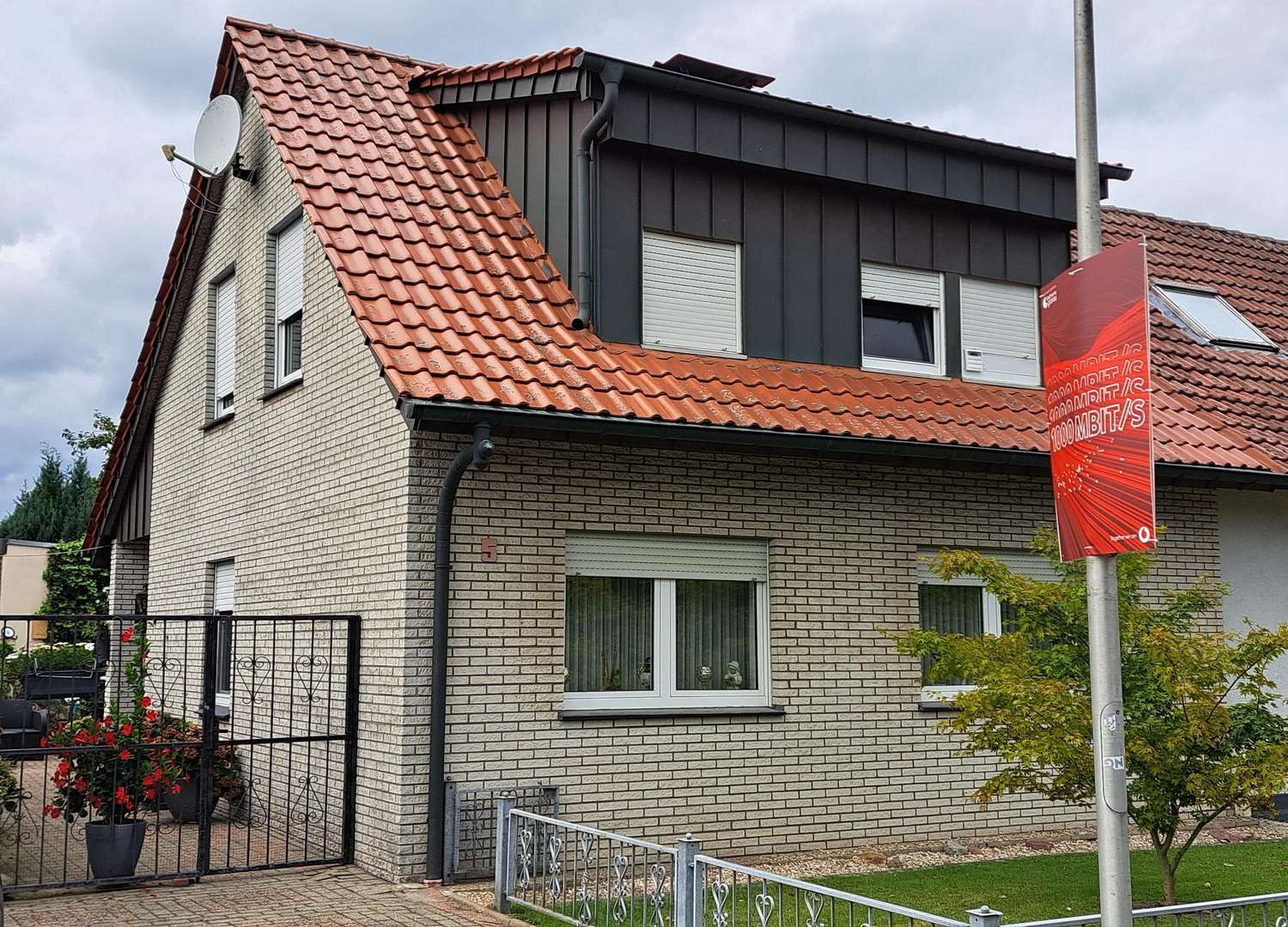 Straßenansicht - Doppelhaushälfte in 48599 Gronau mit 103m² kaufen