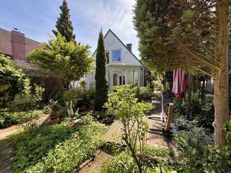 Garten mit Blick auf den Wintergarten - Einfamilienhaus in 45721 Haltern am See mit 117m² kaufen