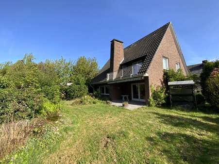 Garten/Straßenansicht - Einfamilienhaus in 48703 Stadtlohn mit 150m² kaufen