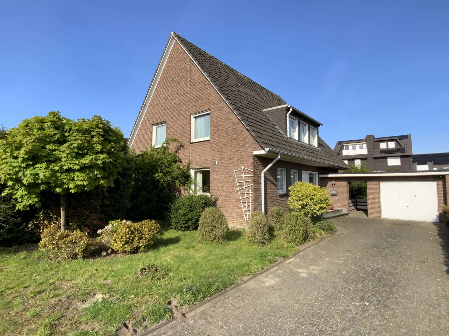 Straßenansicht - Einfamilienhaus in 48703 Stadtlohn mit 150m² kaufen