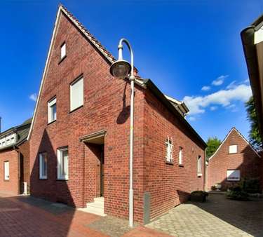 Straßenansicht - Einfamilienhaus in 48703 Stadtlohn mit 112m² kaufen
