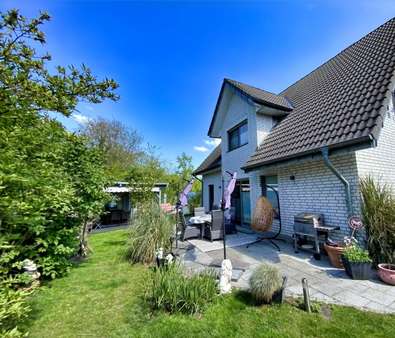 Ansicht vom Garten - Einfamilienhaus in 48624 Schöppingen mit 147m² kaufen