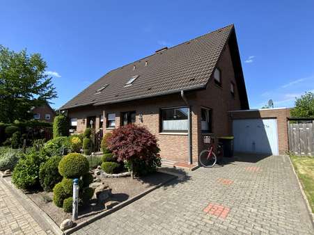 Straßenansicht - Doppelhaushälfte in 48683 Ahaus mit 85m² kaufen