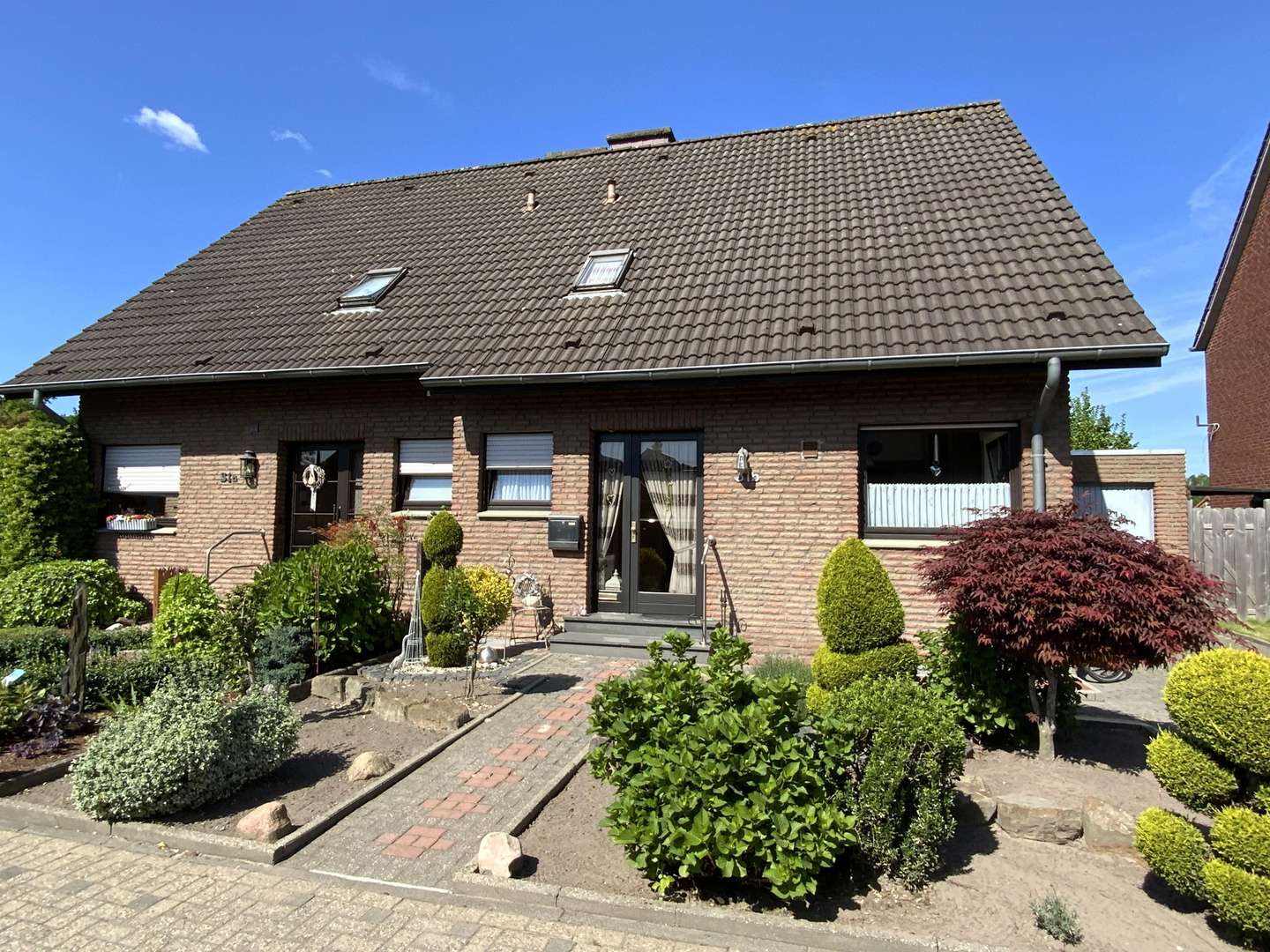 Straßenansicht - Doppelhaushälfte in 48683 Ahaus mit 85m² kaufen