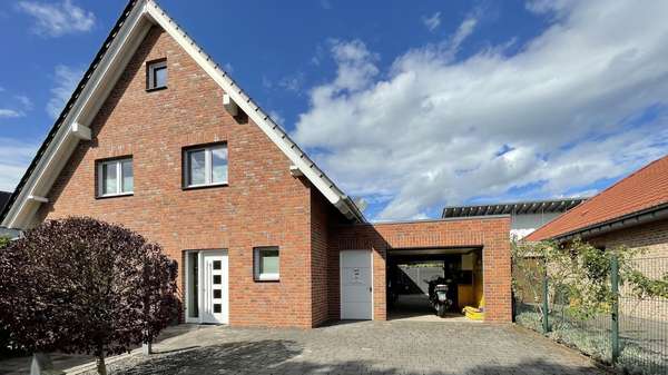 Straßenansicht - Einfamilienhaus in 46419 Isselburg mit 139m² kaufen