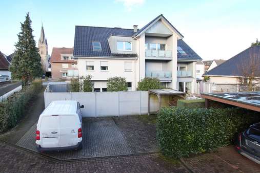 Rückseite vom Haus - Etagenwohnung in 48712 Gescher mit 51m² kaufen