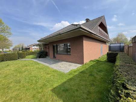 Terrasse und Rasenfläche - Einfamilienhaus in 48653 Coesfeld mit 95m² kaufen