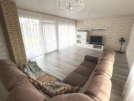 Wohnzimmer - Bungalow in 48599 Gronau mit 118m² kaufen